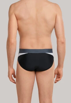 Schiesser Retro Swim Trunks Knitted Fabric Recycled Side Stripes Black - Nautical Active -Uni Style Shop bade retroshorts wirkware recycelt seitliche streifen schwarz nautical active 172767 000 back